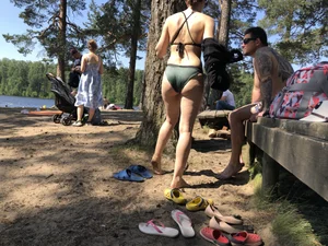 Candid Girl Putting On Swimsuit and Undressing at the Forest Lake Beach Gallery