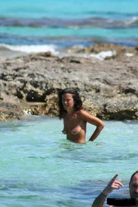 Nude beach ladies in the water showing their tits