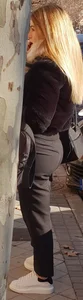 Tiny blonde in black pants