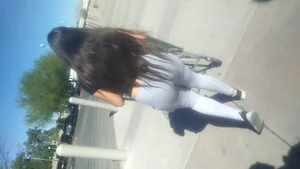 College Latina in gray leggings