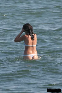 A bunch of sexy beach voyeur babes in bikinis, thongs and topless