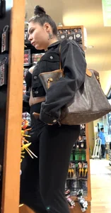 Thick booty in yoga pants at gift shop