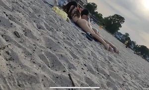 Couple of young and skinny candid girls at the beach creepshots, they noticed the photographer