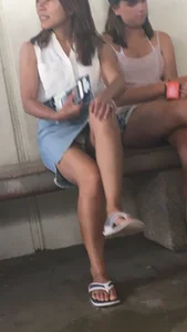 Girl in Flip-Flops And a Denim Skirt Accidentally Flashing Panties While Crossing Her Legs Creepshot