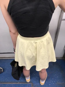 Candid Girl in a Yellow Skirt With Nice Slim Legs Subway Train Creepshots