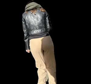 Candid girl in a leather jacket and pants with VPL street creepshots