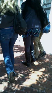 Blonde in tight jeans with her red thong sticking out