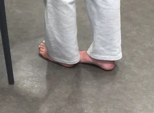 Bare Feet Closeups at a Desk Creepshots Gallery