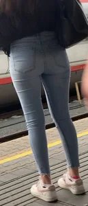 Tight jeans ass at train station