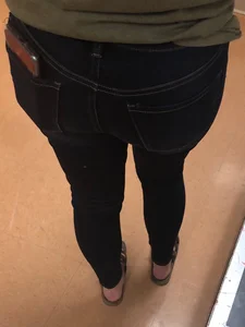 Firm Ass in Tight Jeans With a Phone Put in the Back Pocket Closeup Creepshot