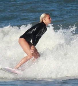 Hot surfer chicks out in the water