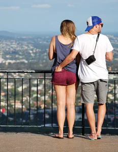 Girl in short maroon shorts with decent booty