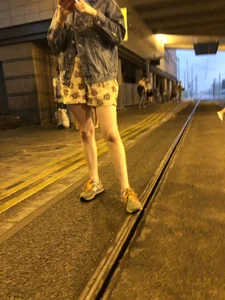 Cute candid girl in a dress with nice legs