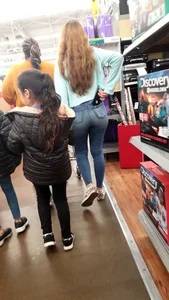 Redhead teen with glasses in tight jeans shopping with a great ass