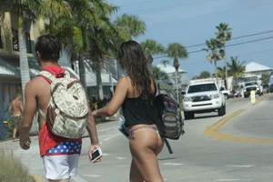 Even more sexy Florida bikini babes including a midget in a bikini