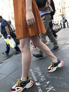 Cute Teen Girl in a Dress With Slim Legs Standing in the Subway Train, Then Crossing the Street Photo Gallery