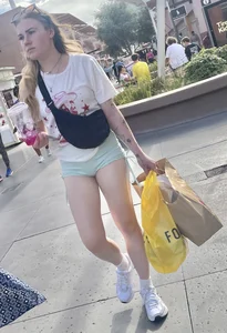 Sexy blonde in green shorts
