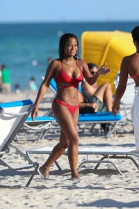 Christina Milian in red bikini in Miami with hard nipples