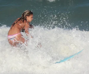 Hot surfer chicks out in the water