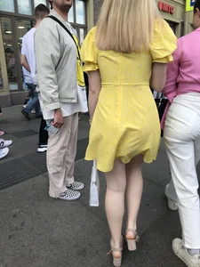 Hot blonde candid chick wearing a yellow dress street creepshots
