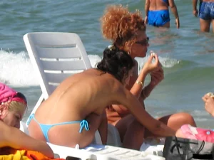 Beach voyeur babes in bikinis, thongs and topless