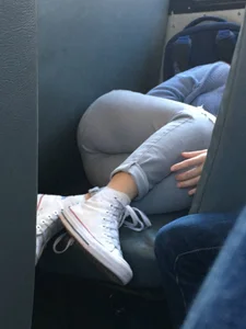 Girl in Tight Jeans Asleep on the Double Seat in the Bus Creepshot