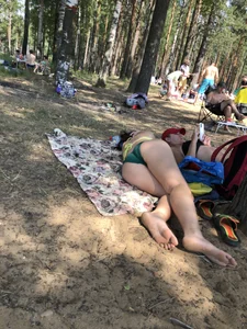 Girl in Swimsuit With Hot Ass Lying on a Towel at a Nature Park Creepshots