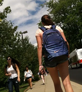 Hot college girl in little jean shorts showing some cheeks and legs