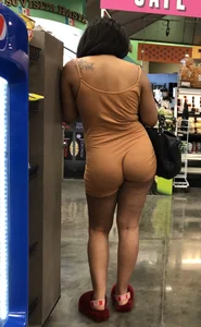 Latina with hard nipples and a big booty in tight spandex shorts outfit