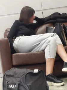 Hot Candid Girl in Pants Sitting on a Couch With Crossed Legs, Nice Booty Creepshot