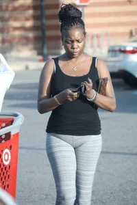Ebony milf out shopping in grey leggings