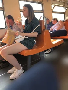 Amazing Hot Girl Sitting in the Train in Shorts Showing Off Her Gorgeous Legs Candid Gallery