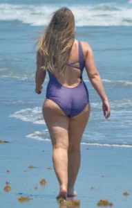 Chubby white girls in bikinis on the beach