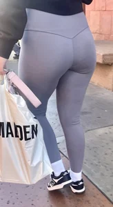 Sexy girl in grey leggings showing ass and cameltoe