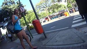 Skinny sexy girl buying ice cream in tight spandex shorts with a nice ass, gap, and camel toe