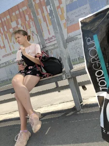Bus Stop Girl Sitting with Crossed Legs Street Candid Photos