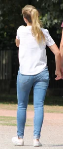Blonde chick walking with her boyfriend in tight jeans