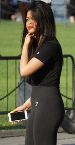 Cute Asian girl in tight leggings with a nice ass