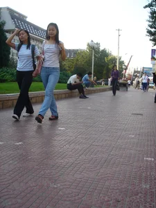 Cute Asian girl with a nice booty in tight jeans