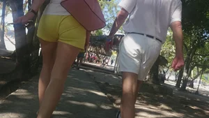 Milf in yellow shorts with vpl and a wedgie