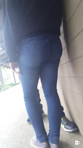 Sexy Butt And Slim Legs in Tight Blue Jeans Street Photo