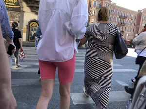 Awesome booty in spandex shorts, candid girl on a sidewalk