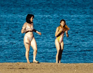 Ladies literally making out on beach
