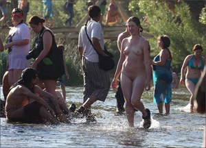 Only one is nude - group photos where only 1 girl is naked, and the rest of the people are dressed