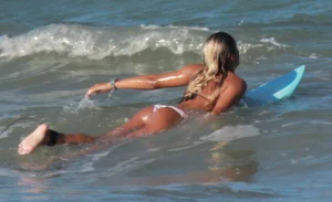 Hot surfer chicks out in the water