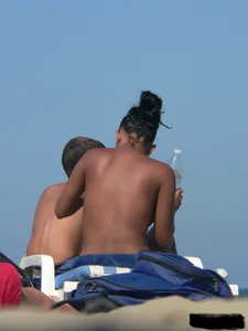 Hot ass topless beach girl with great tits lets her little brother oil up her ass in thong bikini