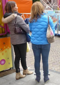 Two street market milfs in tight jeans