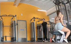 Gym brunette in tight grey shorts