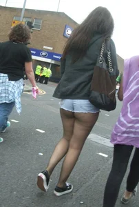 Candid cunny brunette in pantyhose and shorts showing her ass cheeks