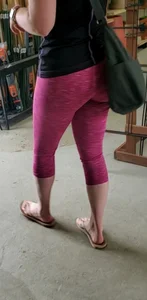 Milf shopping with a nice ass in tight maroon leggings